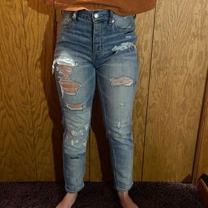 Embroidered ripped jeans